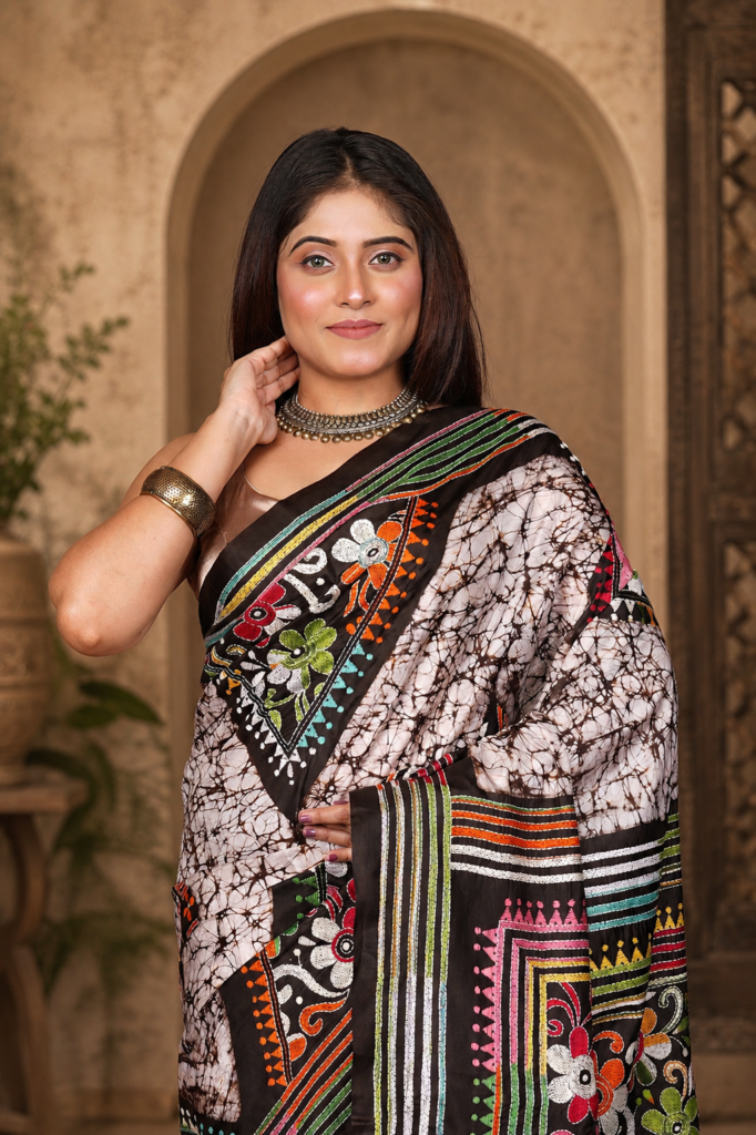 Batik Print Saree — featuring detailed floral and traditional artwork along the border and pallu