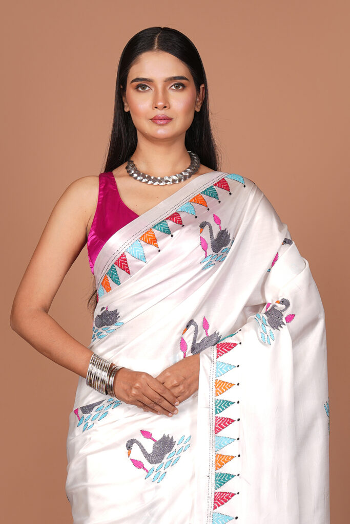 Handloom Saree (featuring swan/hamsa motifs and geometric temple border)