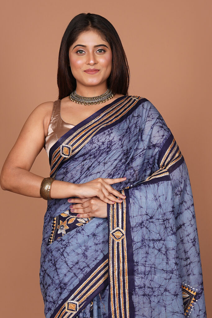 Batik Printed Saree with an embroidered/embellished border