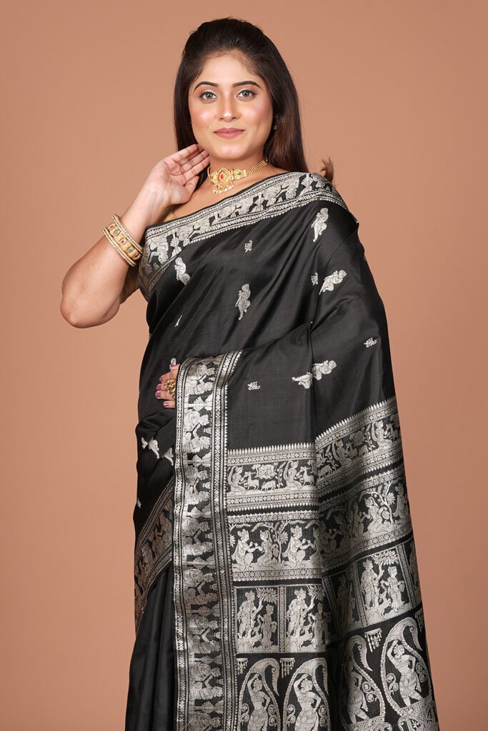 Traditional Handloom / Tussar-Art Silk Saree featuring intricately woven metallic motifs (Swarnachari / Baluchari style figurative zari work).