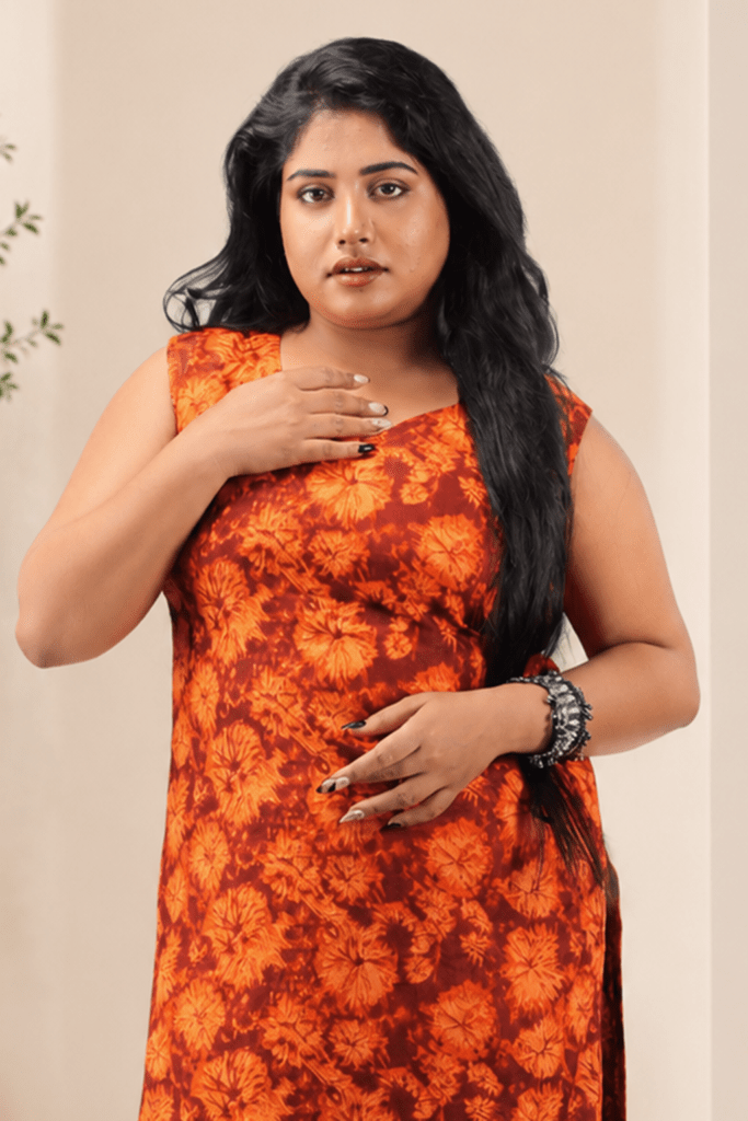 Coral Orange Floral Printed Sleeveless Cotton Kurti